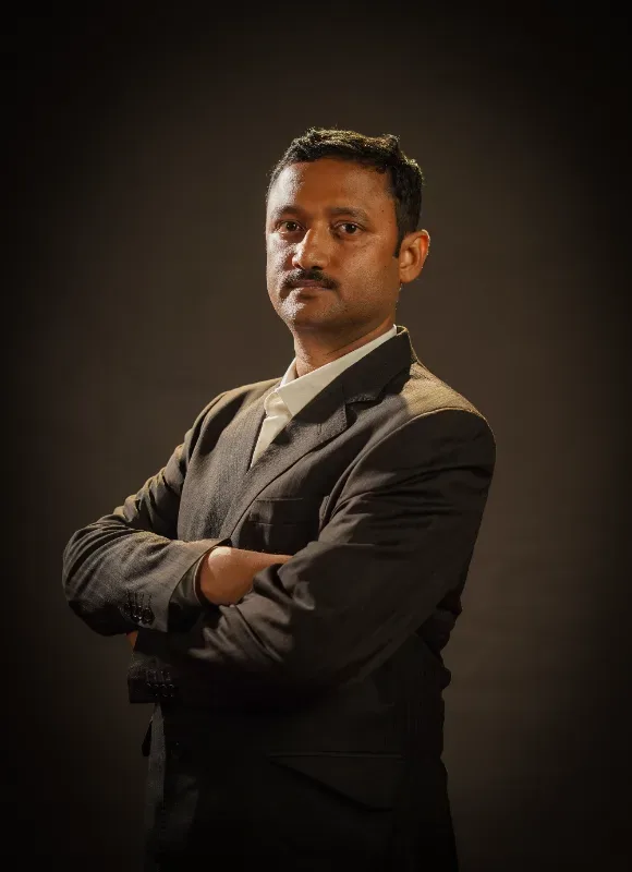 Dr. ANUPAM DE