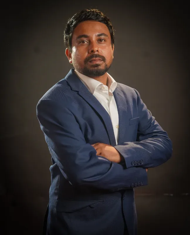 Dr. MANOJIT DAS