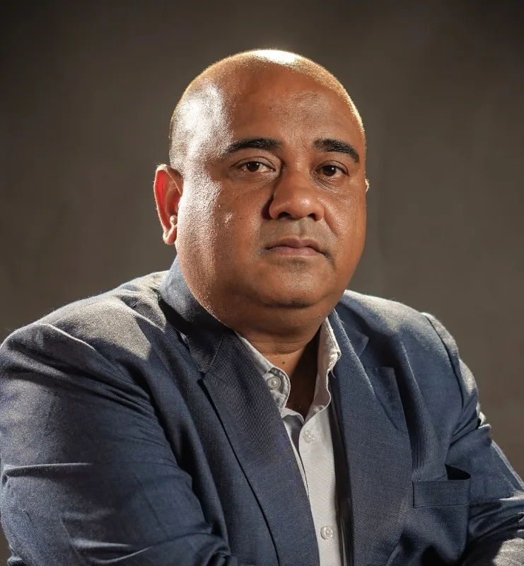 Dr. Tilak Mukherjee